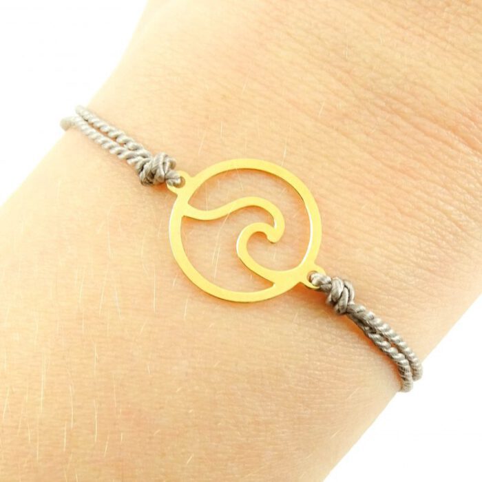 Armbandje met golf goud