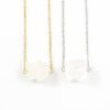 'Raw stone' ketting bergkristal - zilver of goud staal