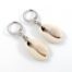 Oorbellen met cowrie schelpje stainless steel