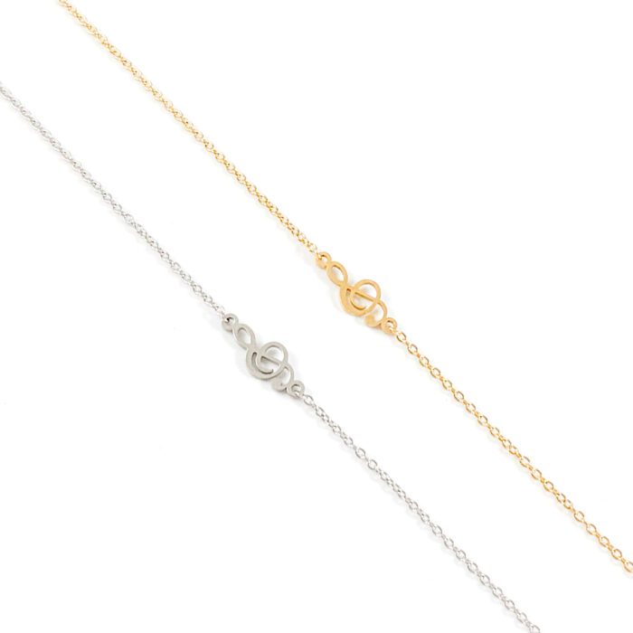 Armbandje met g-sleutel goud of zilver staal